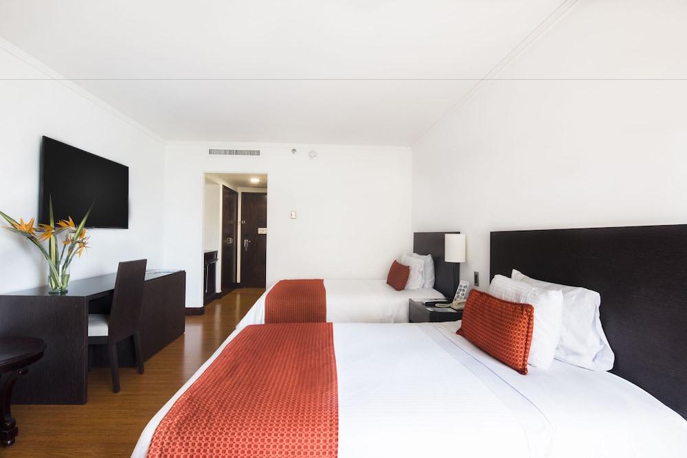 Hotel Dann Carlton Belfort Medellín Exteriér fotografie A room at the hotel
