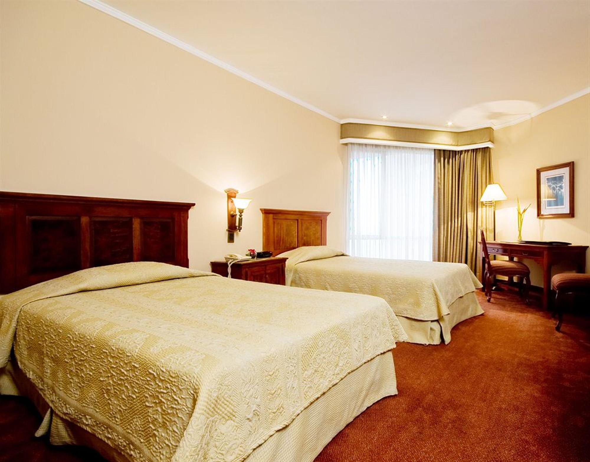 Hotel Dann Carlton Belfort Medellín Exteriér fotografie A room at the hotel